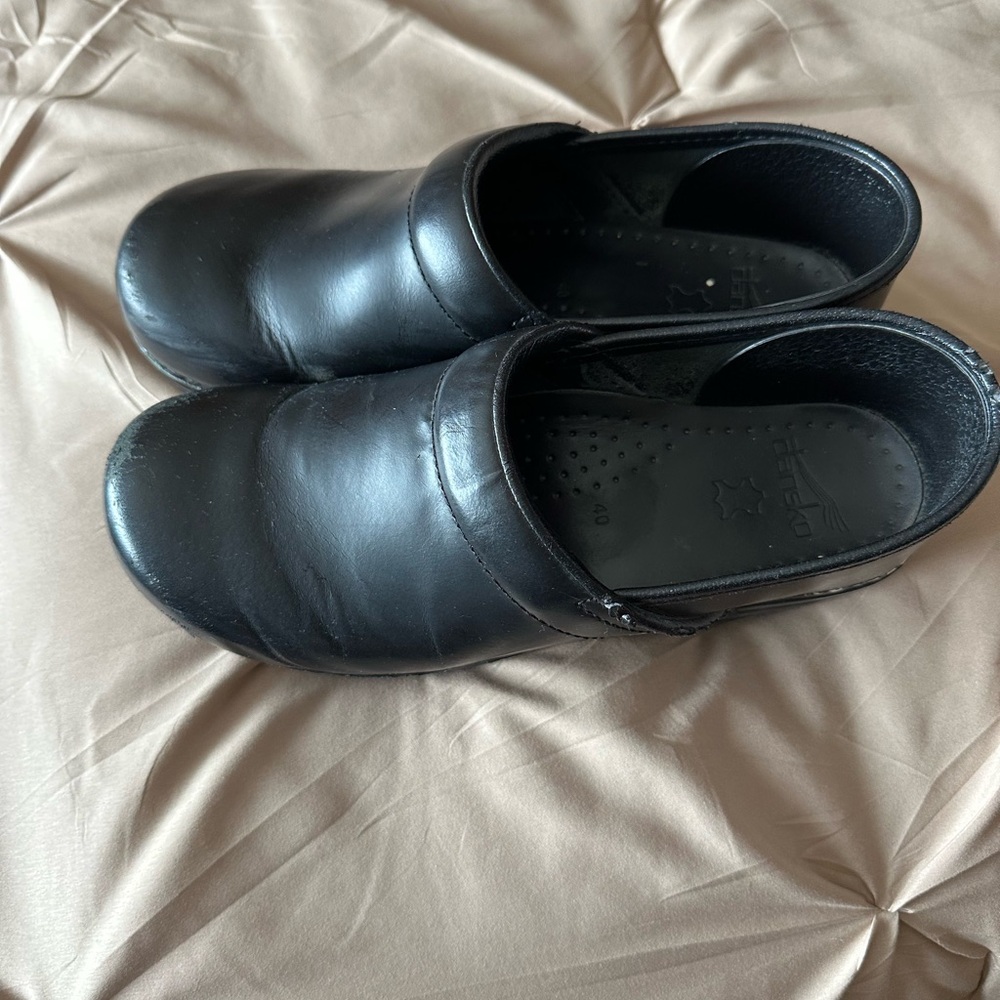 Dansko Men's Sleek Black Slip-On Loafers